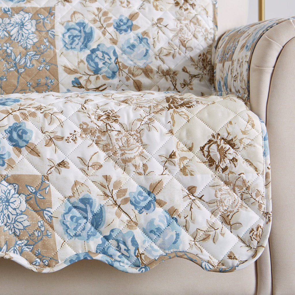 Reversible floral patchwork sofa protector with blue flowers on cream diamond quilting