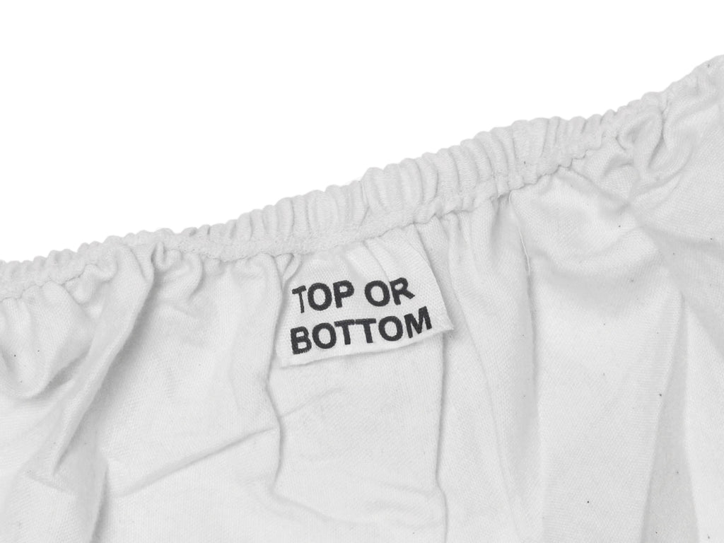 White sheet with elastic waistband and "TOP OR BOTTOM" label