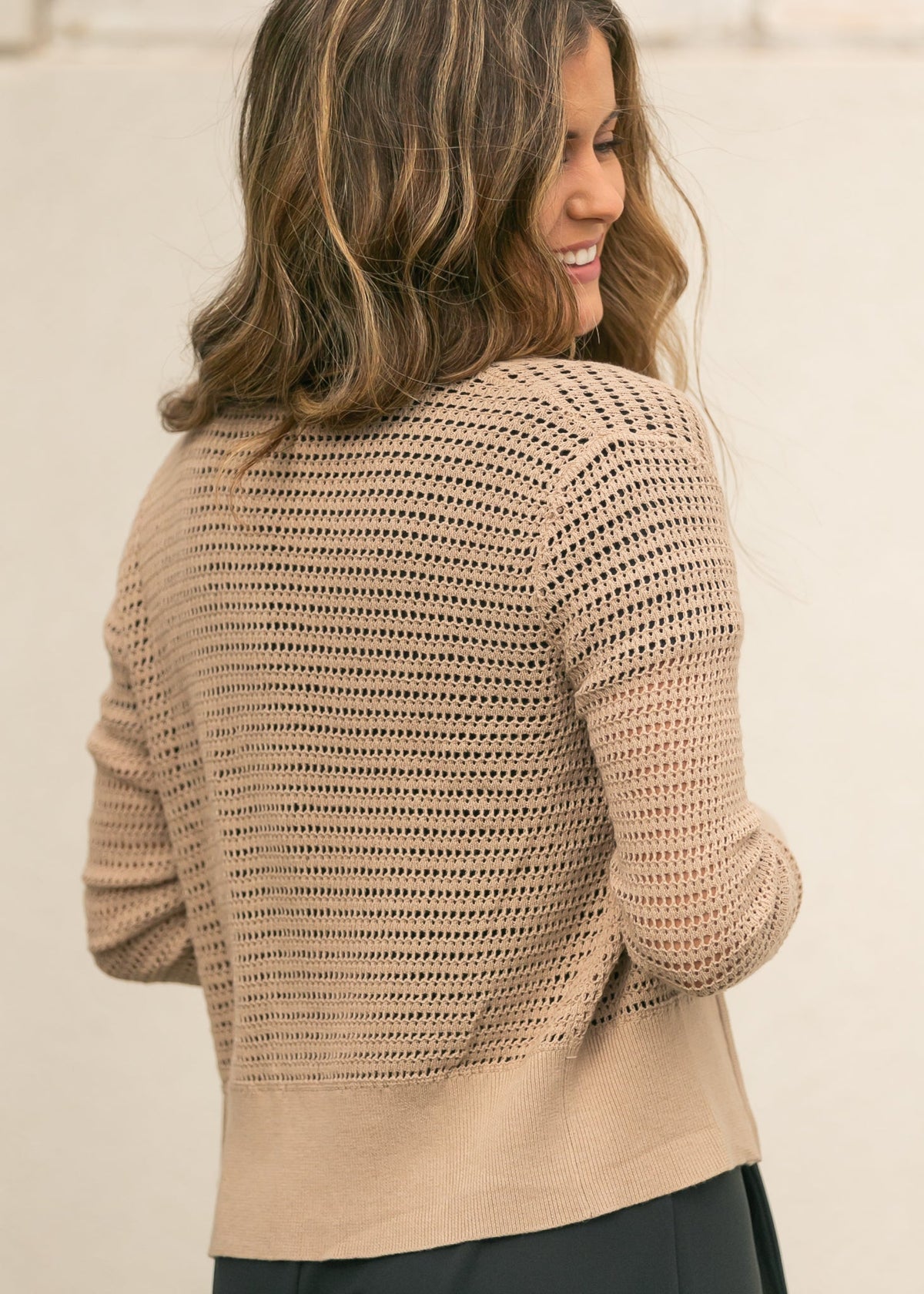 Beige open-knit crochet cardigan, view of back and long sleeves