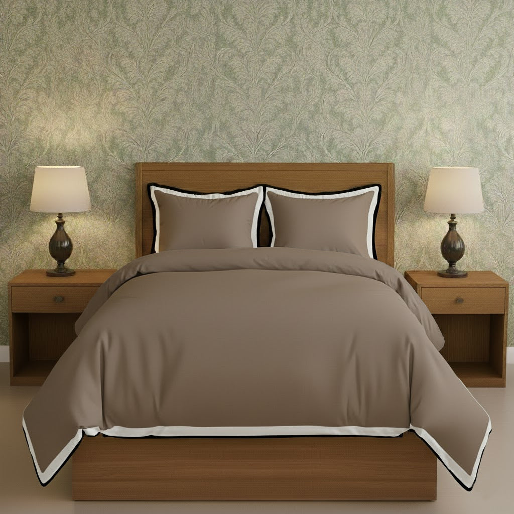 Taupe duvet cover set with white border frame and matching pillow shams