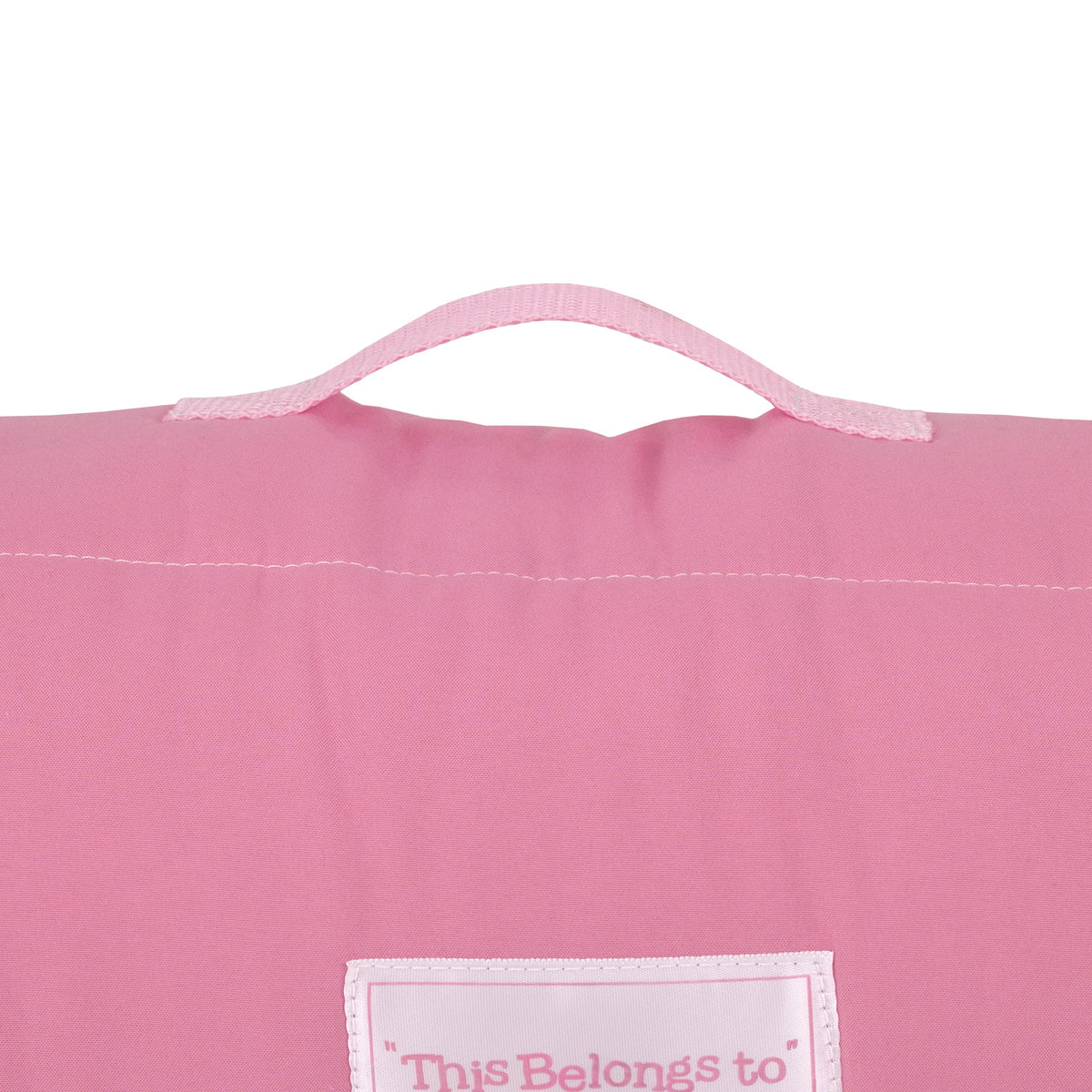 Toddler nap mat pink fabric with “This Belongs to” label and pink handle loop