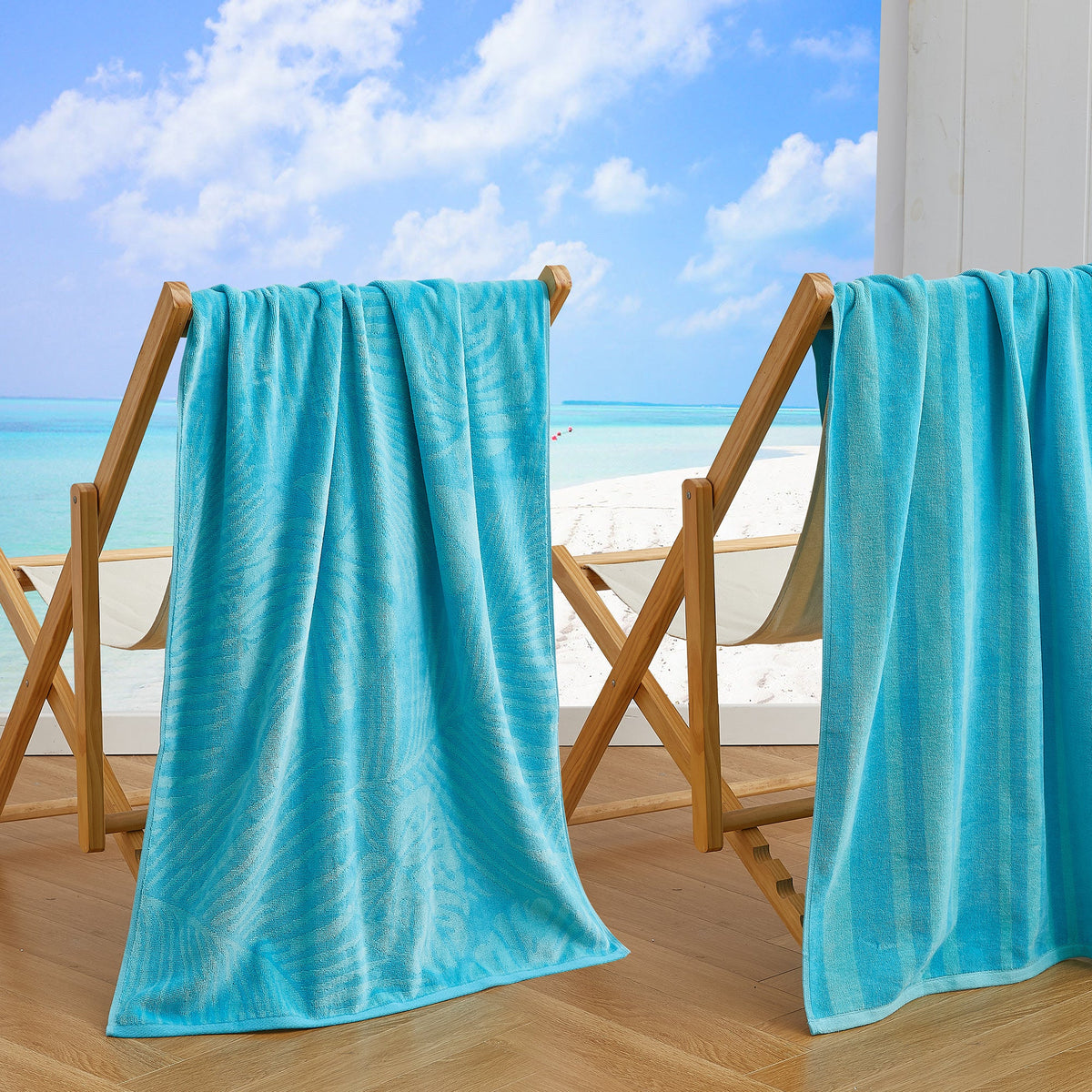 Blue cotton velour beach towels draped over wooden chairs, sea-life print