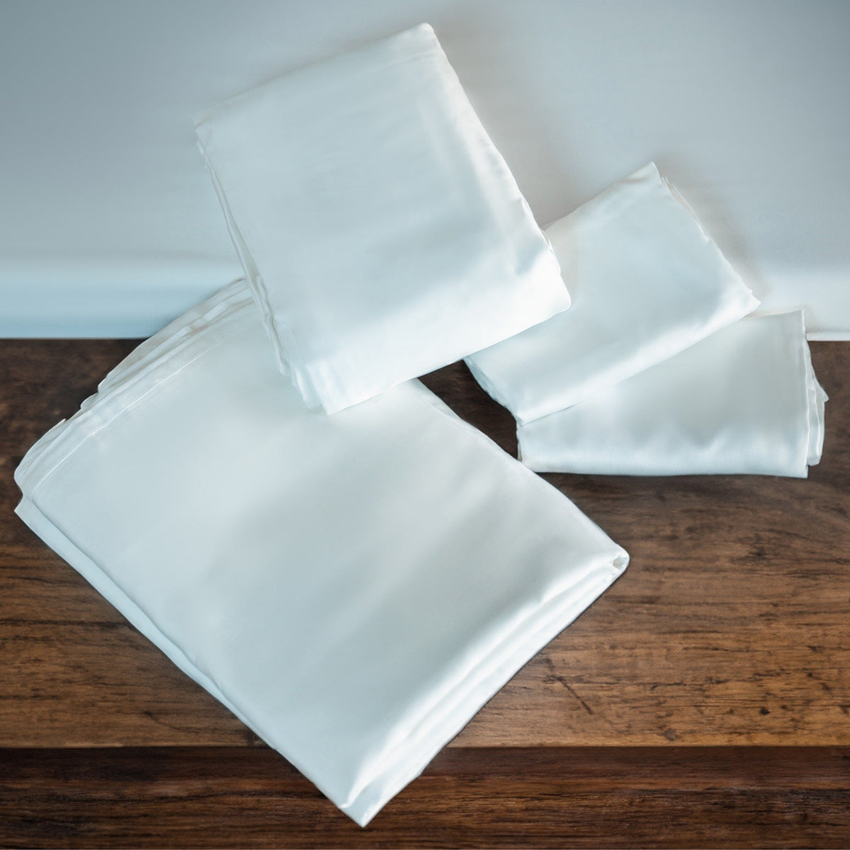 Folded light blue sheet set and pillowcases