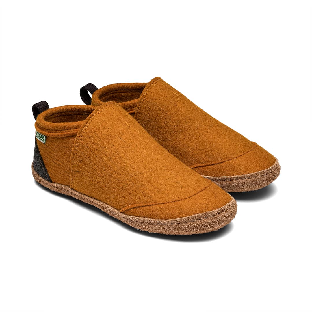 Pair of orange slip-on felt slippers with brown sole and elastic collar