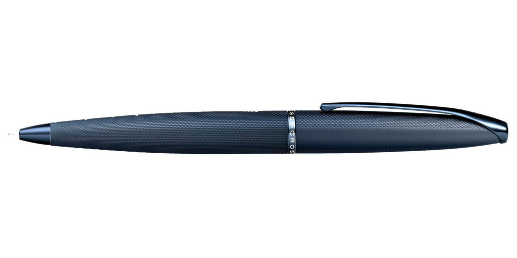 Dark blue ballpoint pen with clip and silver band near the tip