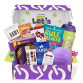 Open purple snack box with colorful packaged foods and branded items