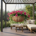 Brown and white Talavera hanging ceramic planter with pink flowers