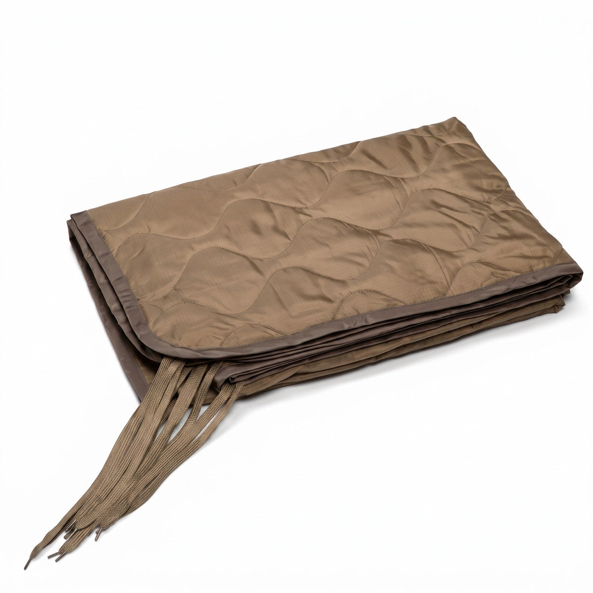 Woobie blanket in coyote tan, folded stack with tie cords