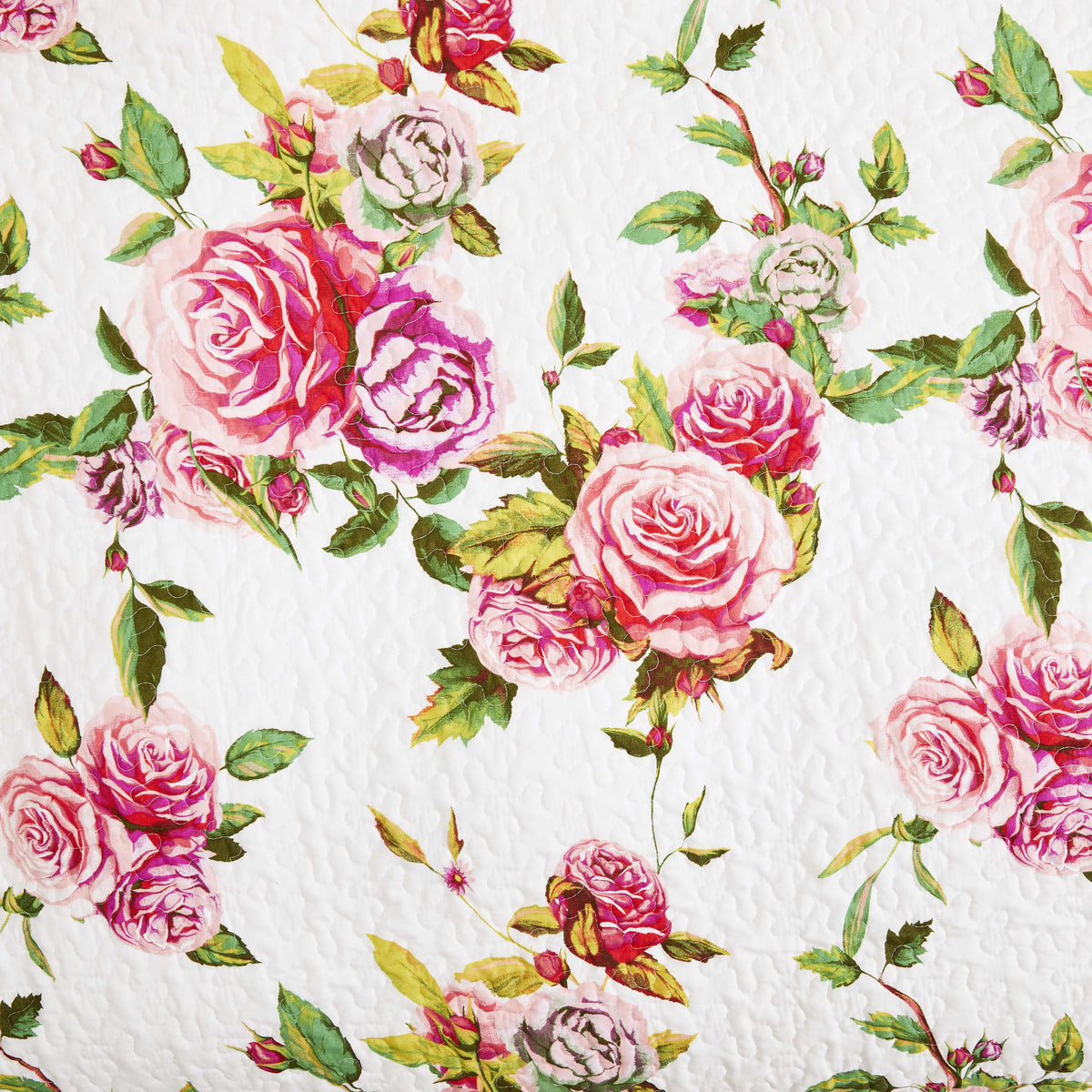 White quilted throw blanket with all-over pink rose and green leaf pattern