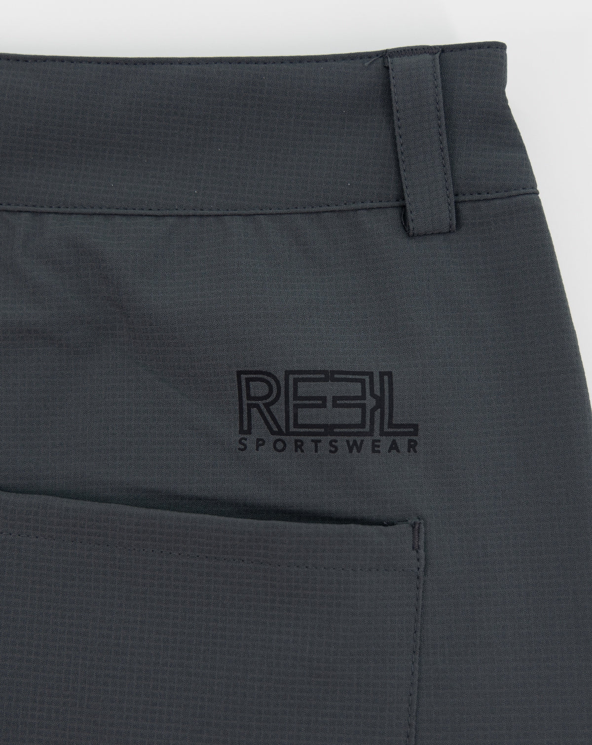 Dark gray REEL sportswear shorts with belt loops and front logo