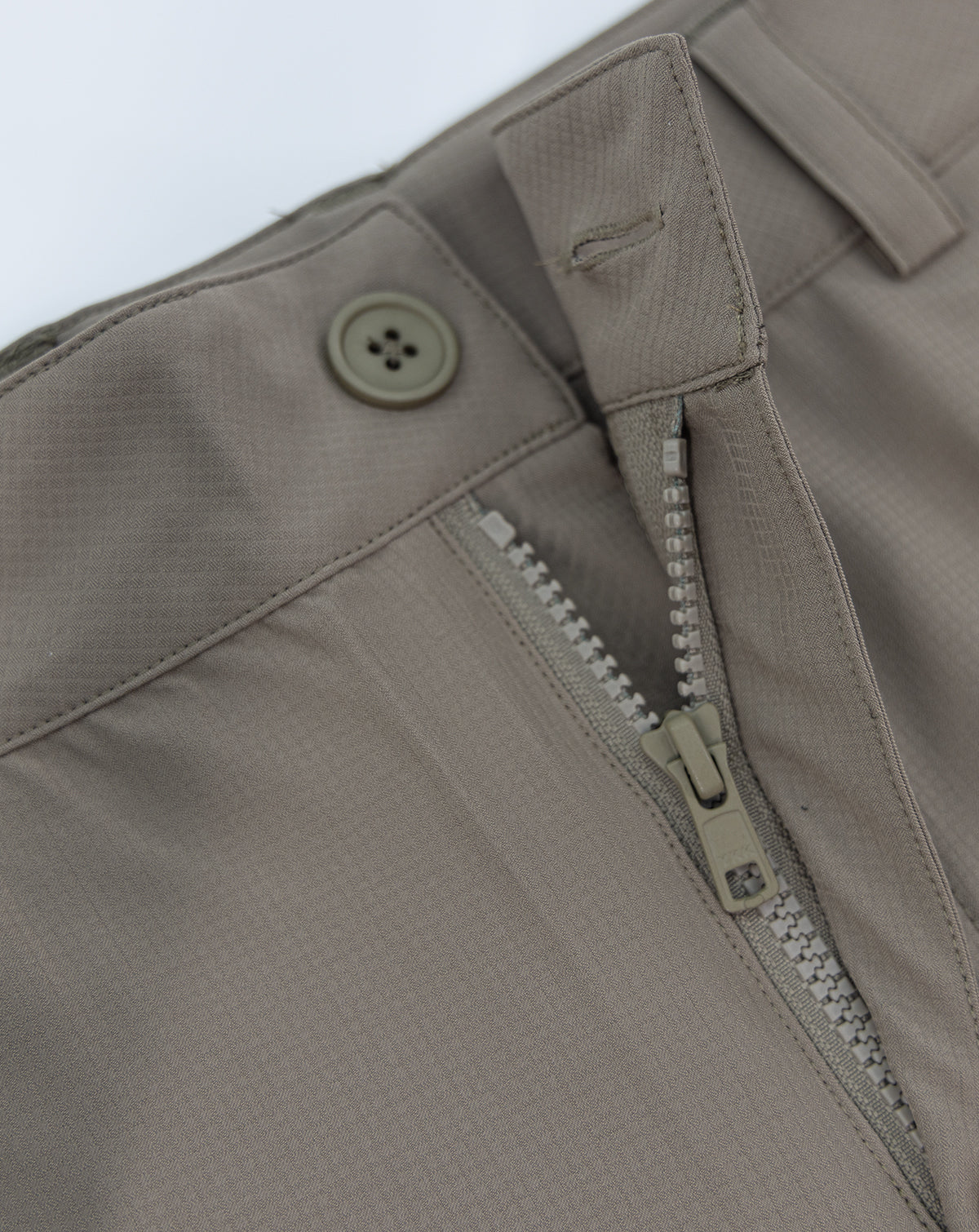 Tidal shorts in khaki with button fly, zip front, and belt loops
