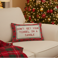 Red cotton lumbar pillow with green polka dots and 'DON'T GET YOUR TINSEL IN A TANGLE' quote