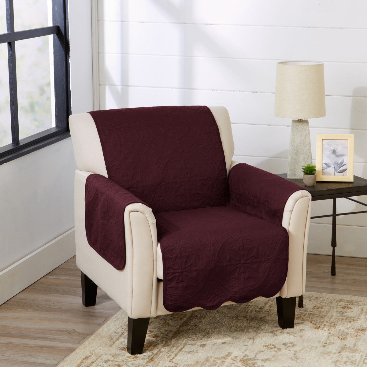 Wine red medallion furniture protector cover on armchair
