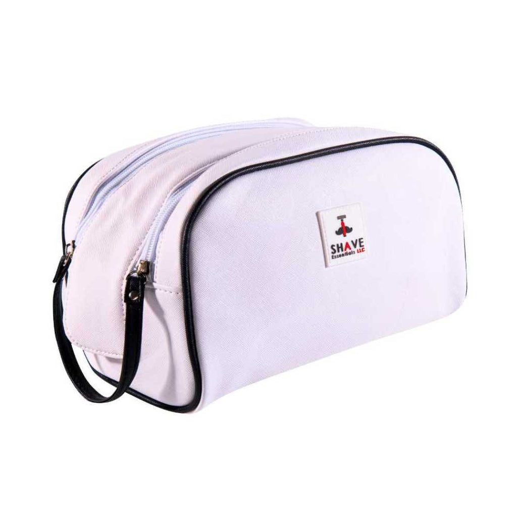 Light pink zip toiletry bag with black zipper and T SHAVE logo patch