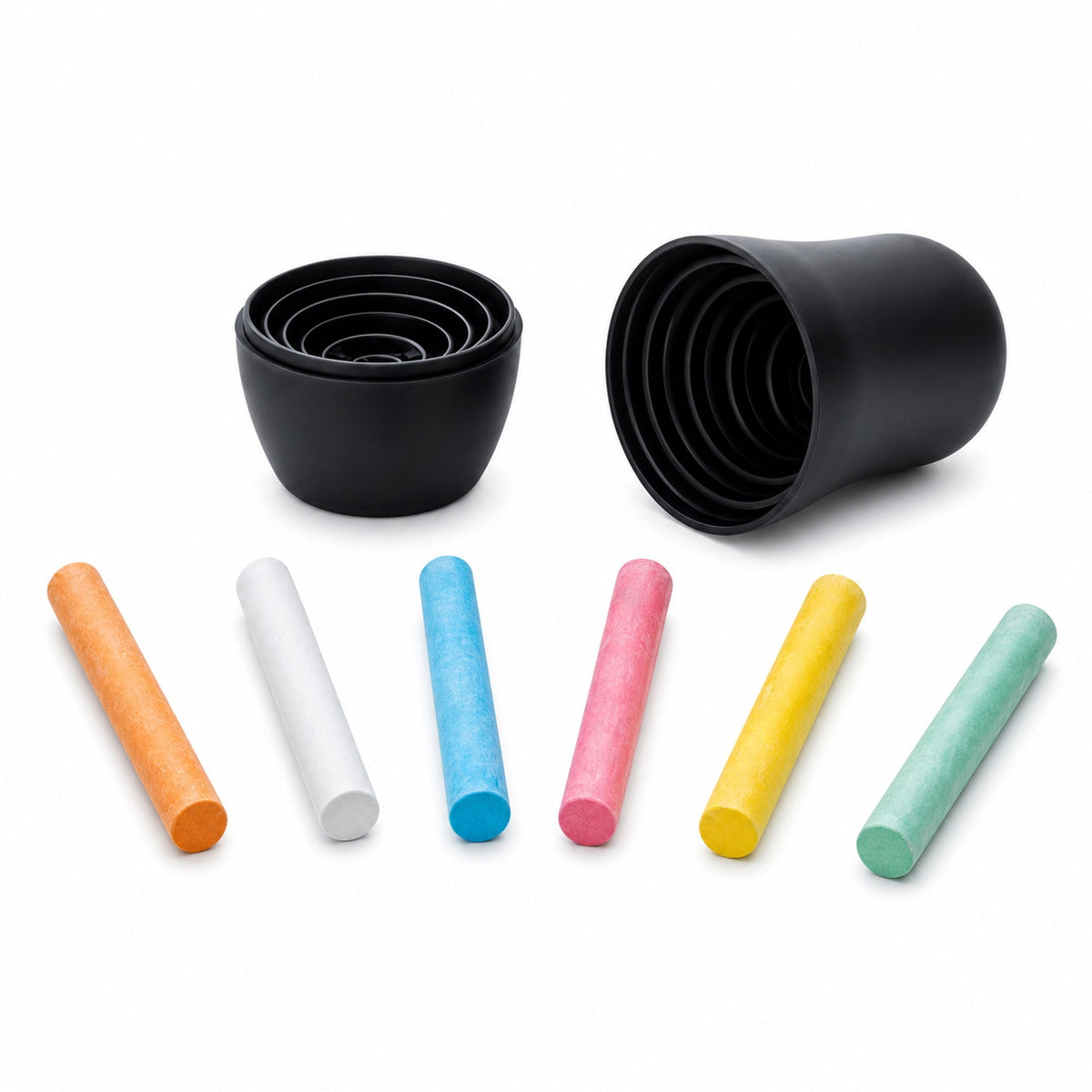 Nested black chalkboard dolls shown opened beside six colored chalk sticks