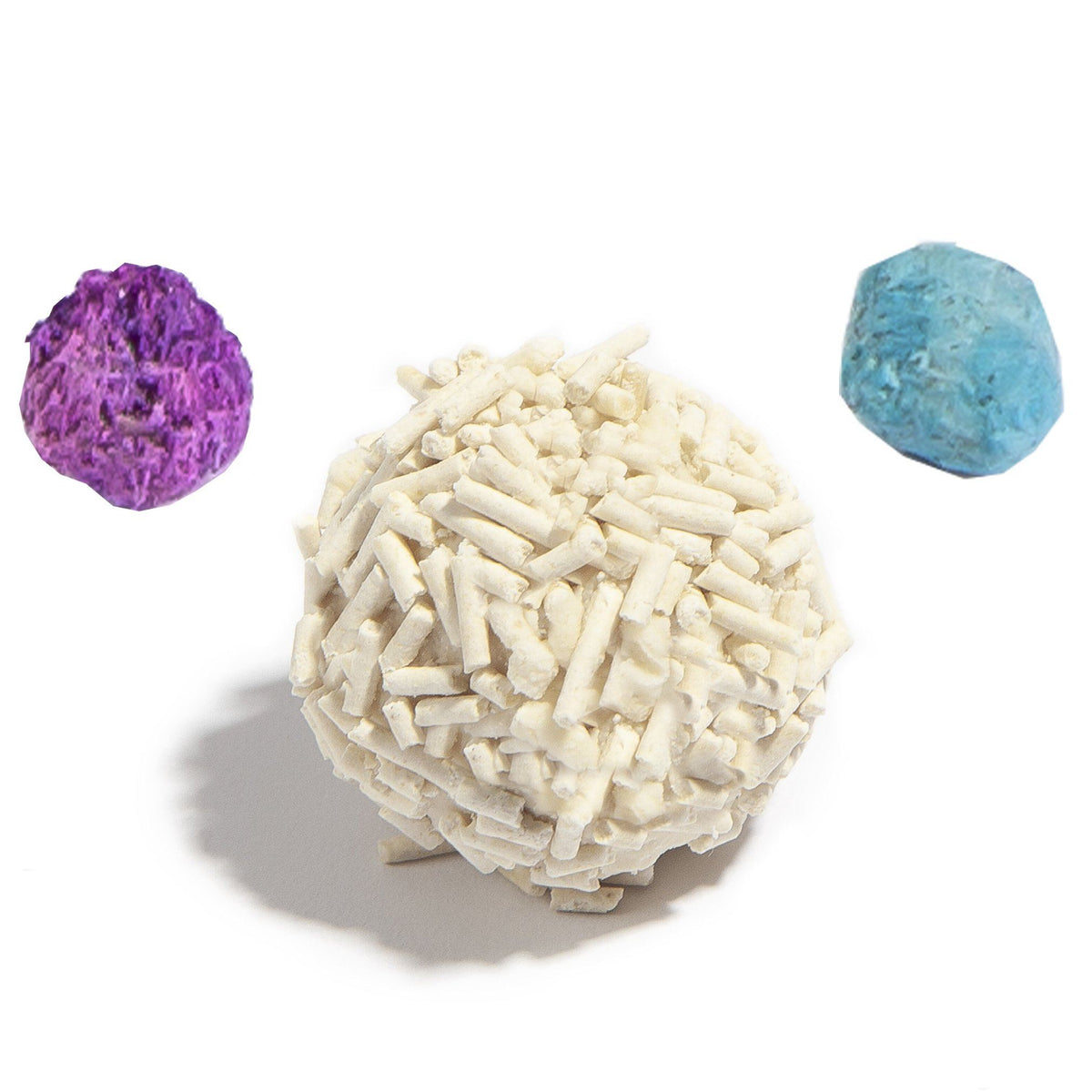 Round clump of pale pellet cat litter with blue and purple granules