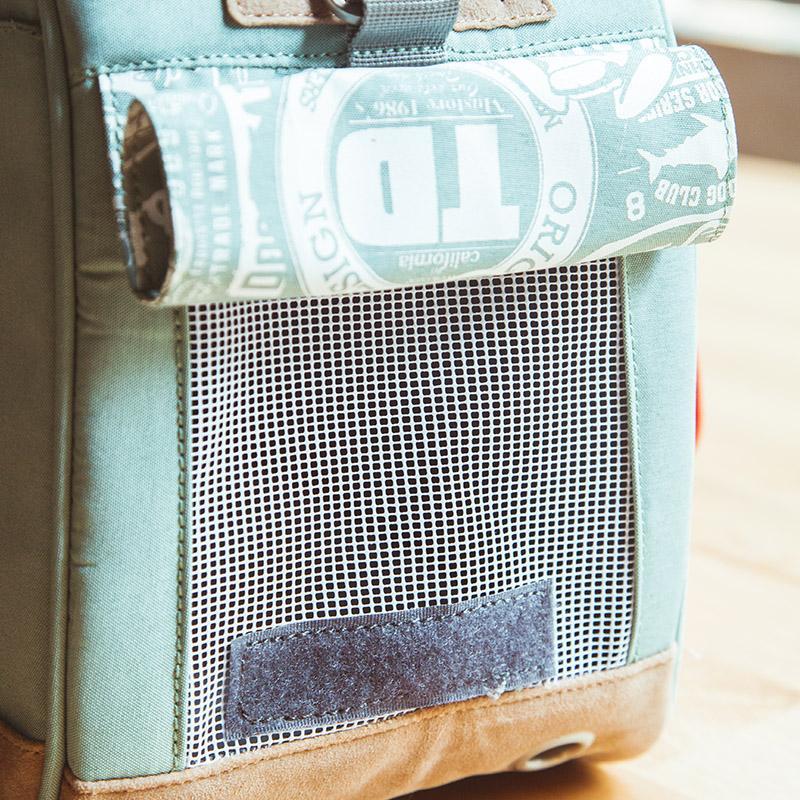 Touchdog teal carrier ventilation mesh and printed flap detail