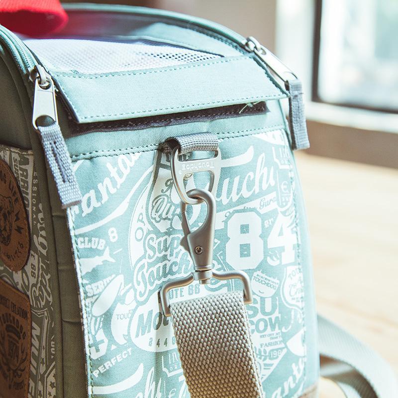 Touchdog teal carrier side with mesh panel, zipper and clip-on shoulder strap
