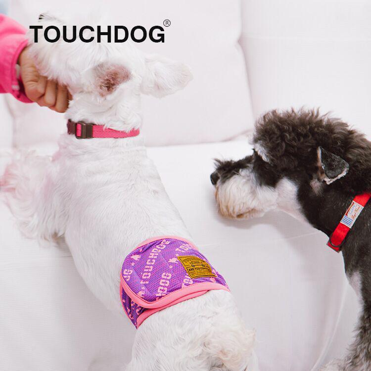 Touchdog purple dog compression sleeve with pink trim worn over a white dog's hindquarters