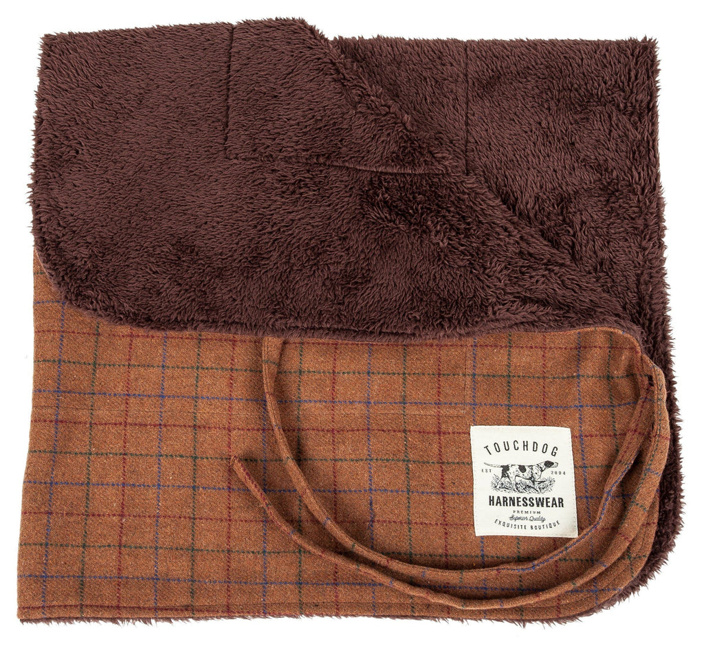 Reversible dog mat with brown plaid side and soft dark brown fleece lining