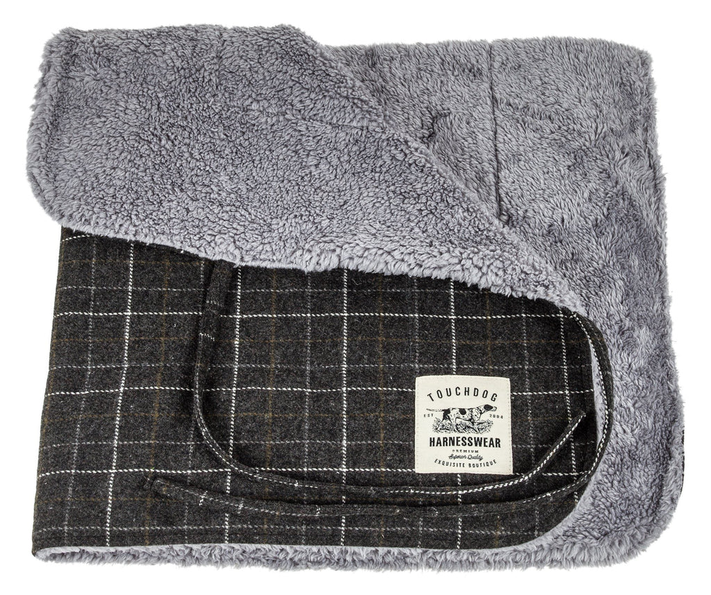 Reversible dog mat with dark gray plaid side and soft gray fleece lining