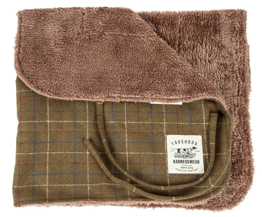 Reversible dog mat with olive plaid side and soft brown fleece lining