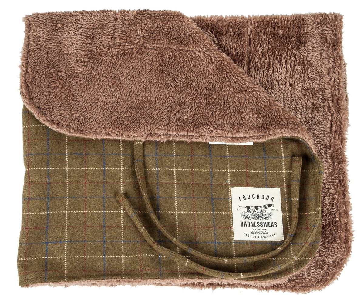 Reversible dog mat with olive plaid side and soft brown fleece lining