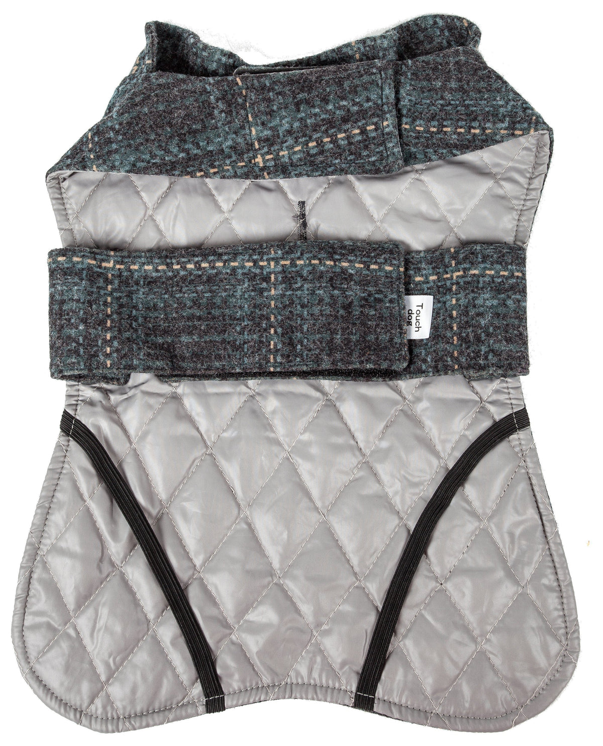 Touchdog dog jacket interior, showing quilted lining, belly straps, and leg openings