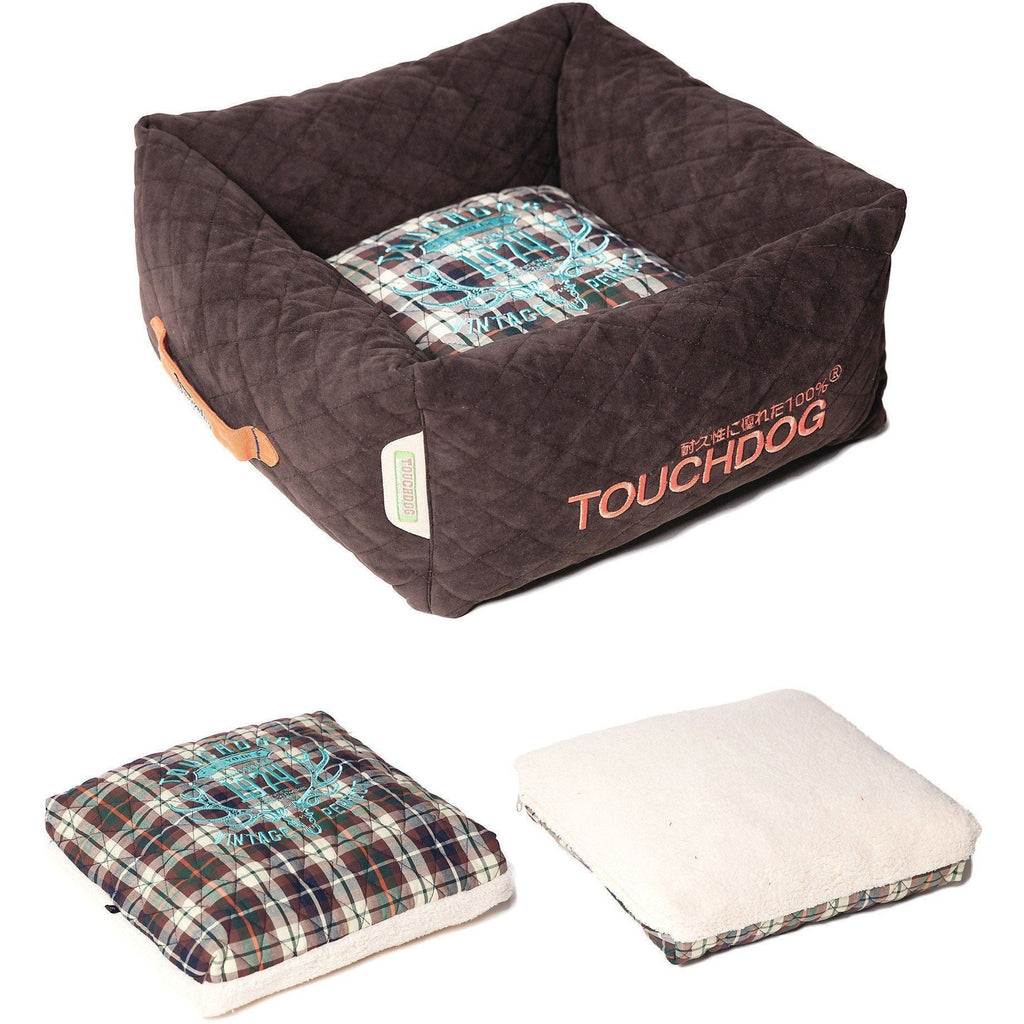 Dark brown quilted dog bed with plaid cushion and removable cream-backed pad