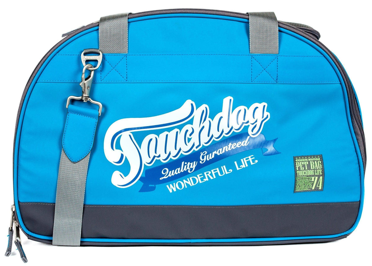 Touchdog blue dog carrier with front logo, gray shoulder strap and dark base