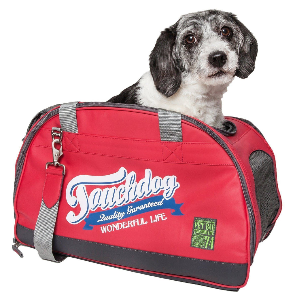Touchdog red dog carrier with gray straps, shown with a dog inside.