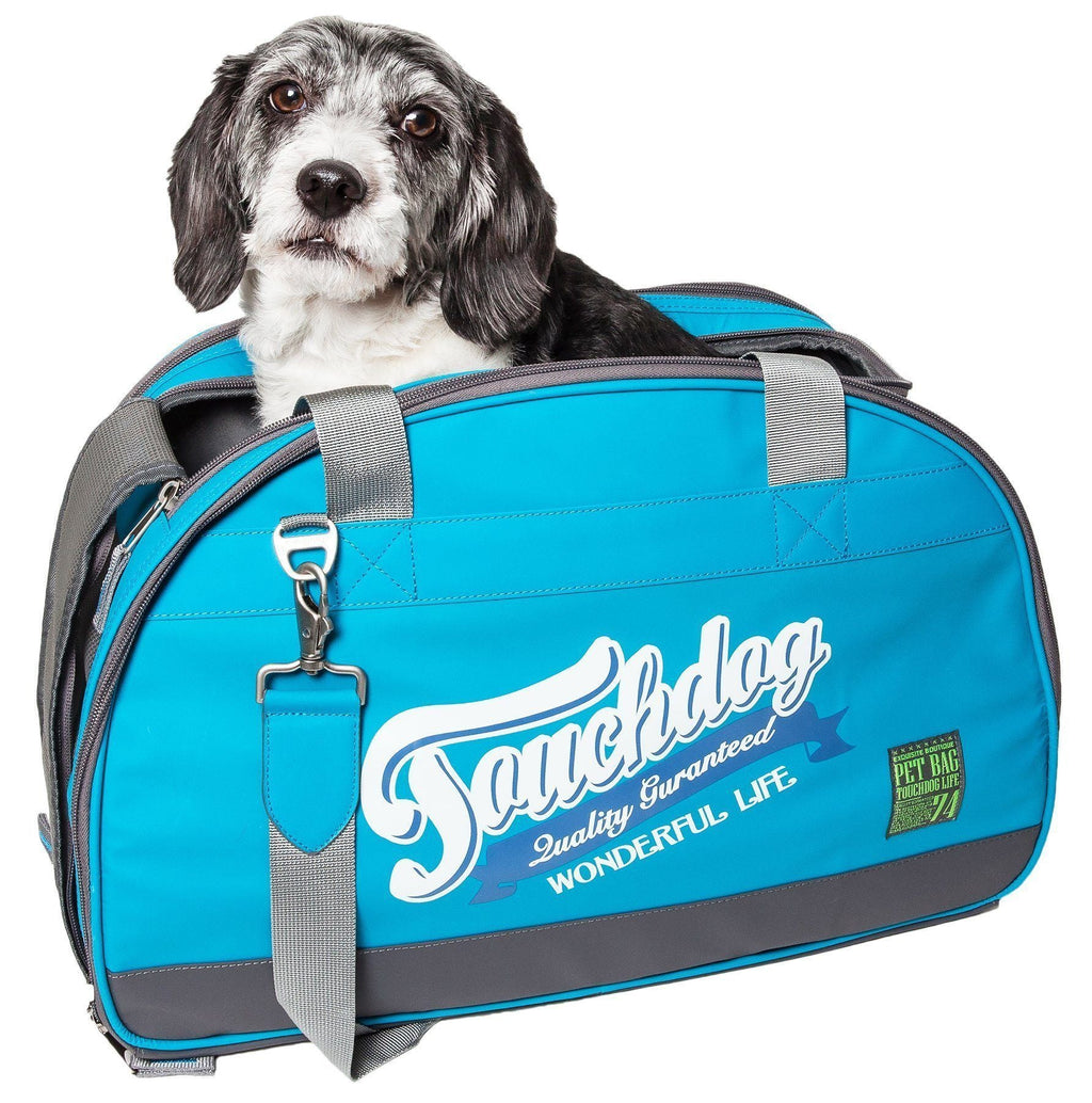 Touchdog dog carrier in blue with gray straps, shown with a dog inside.