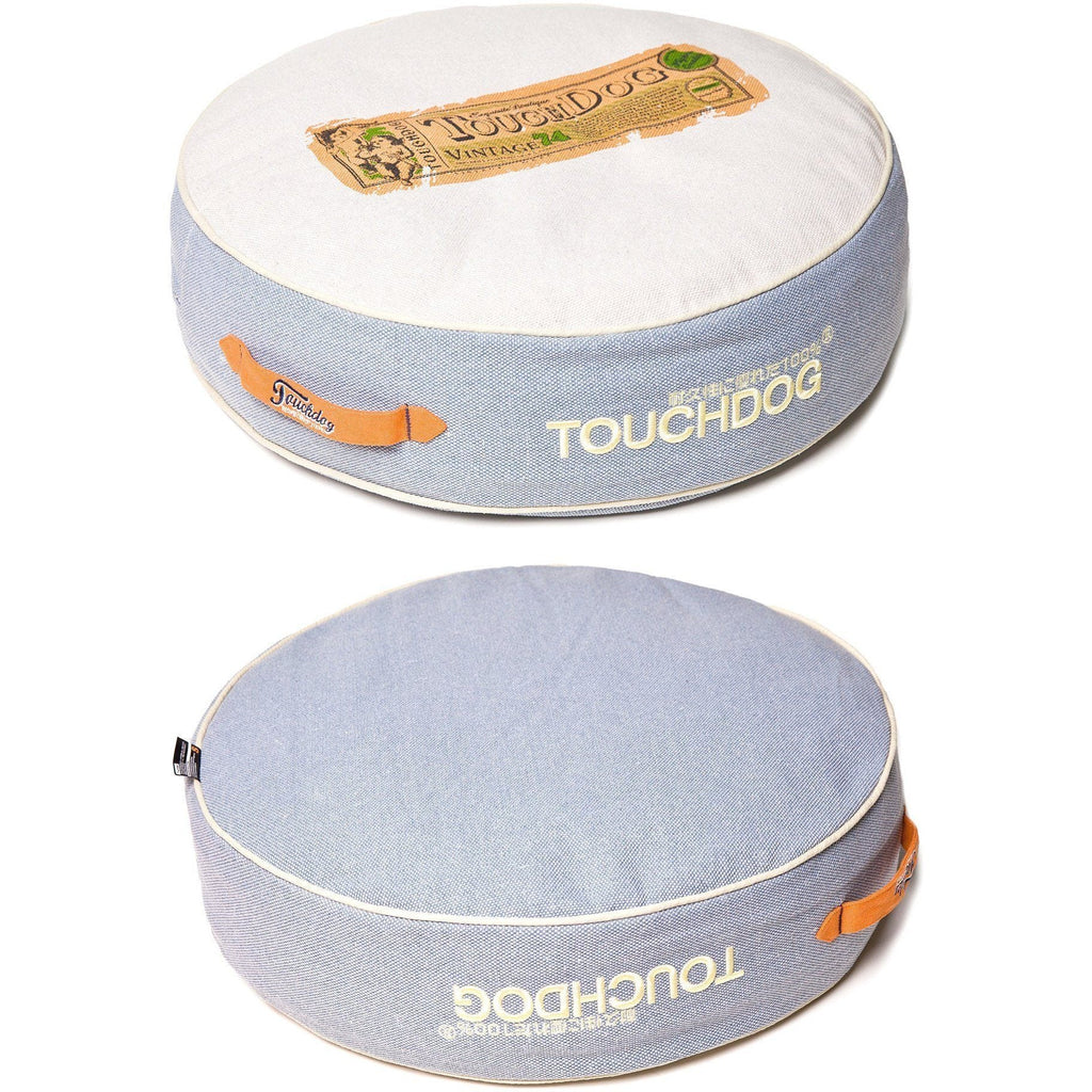 Touchdog round denim dog bed shown from above and underneath, with white and blue sides