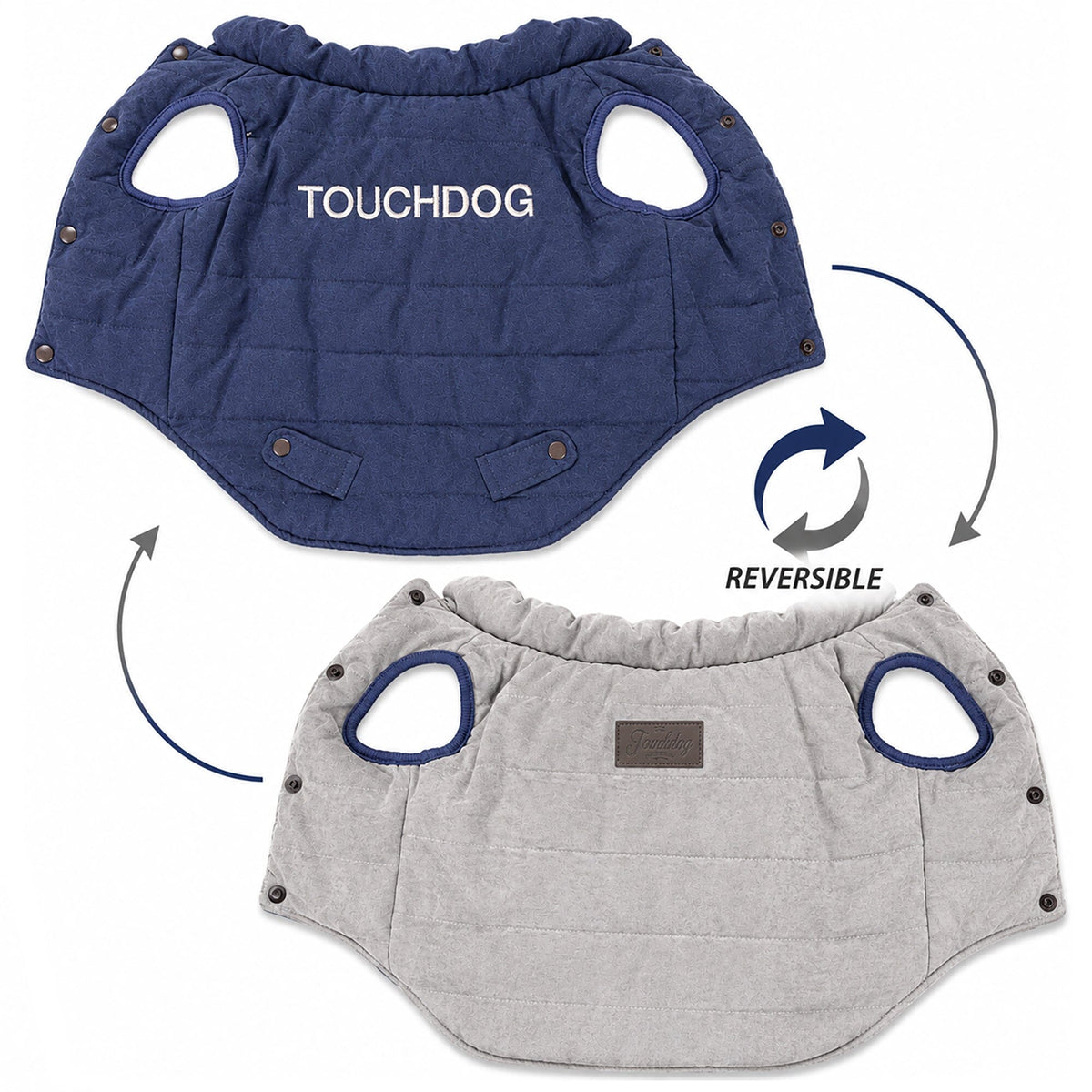 Reversible dog coat laid flat, showing navy and light gray sides, leg openings, and snaps.