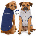 Touchdog reversible dog coat shown on dogs in navy and light gray, with snap closures.