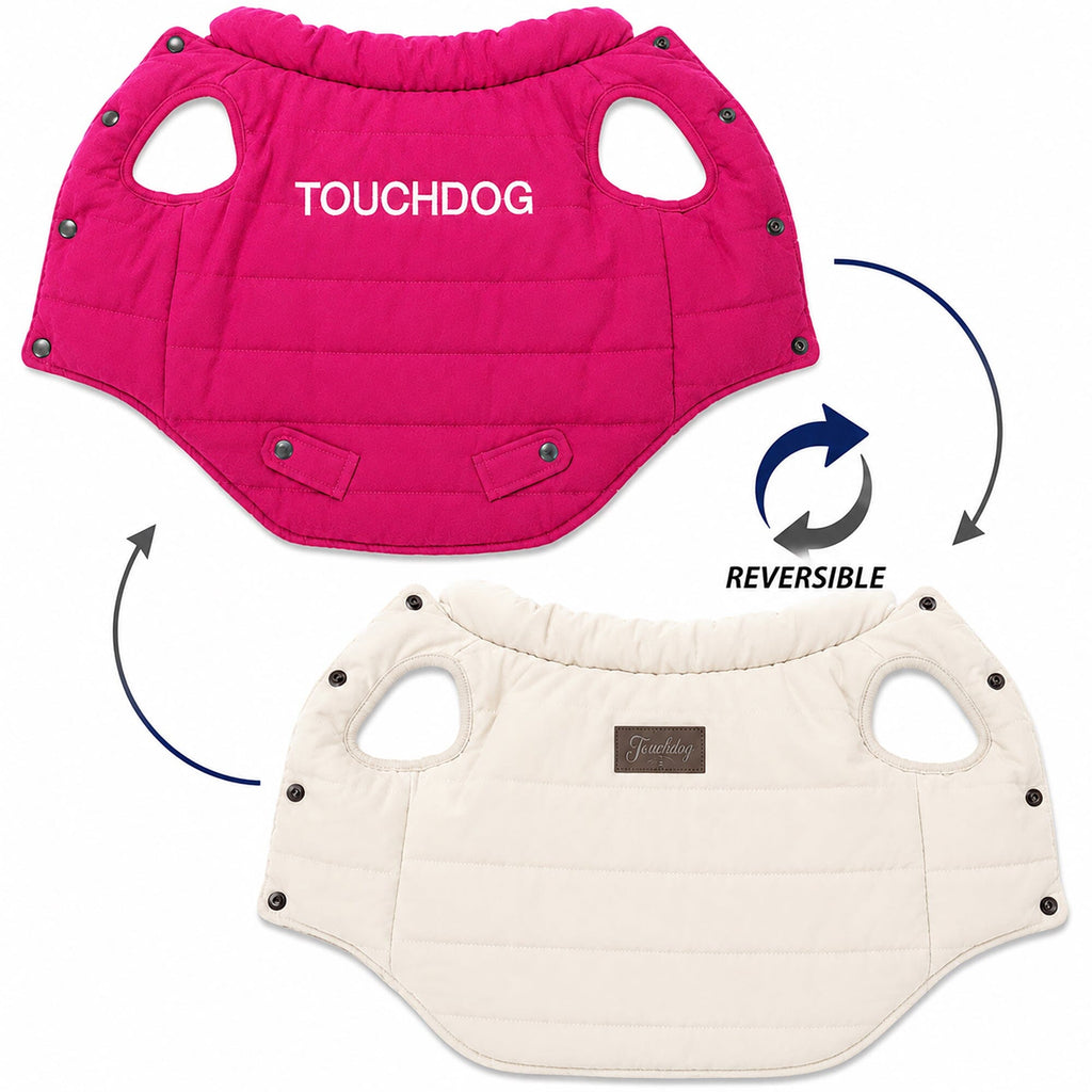 Touchdog reversible dog coat shown flat in pink and white, with leg openings and snap closures.