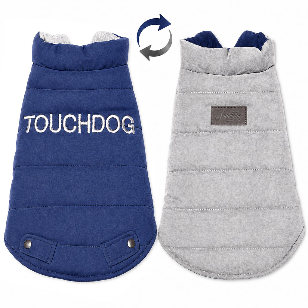 Reversible dog coat shown inside out in navy and light gray, with padded horizontal quilting.