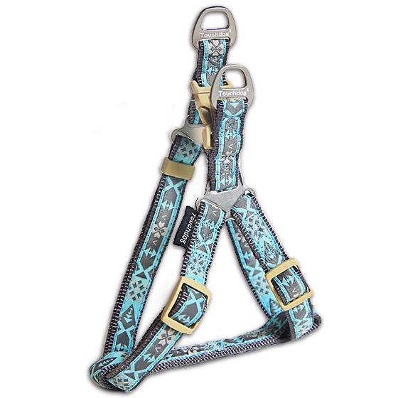 Blue geometric-pattern dog harness with adjustable straps and metal hardware
