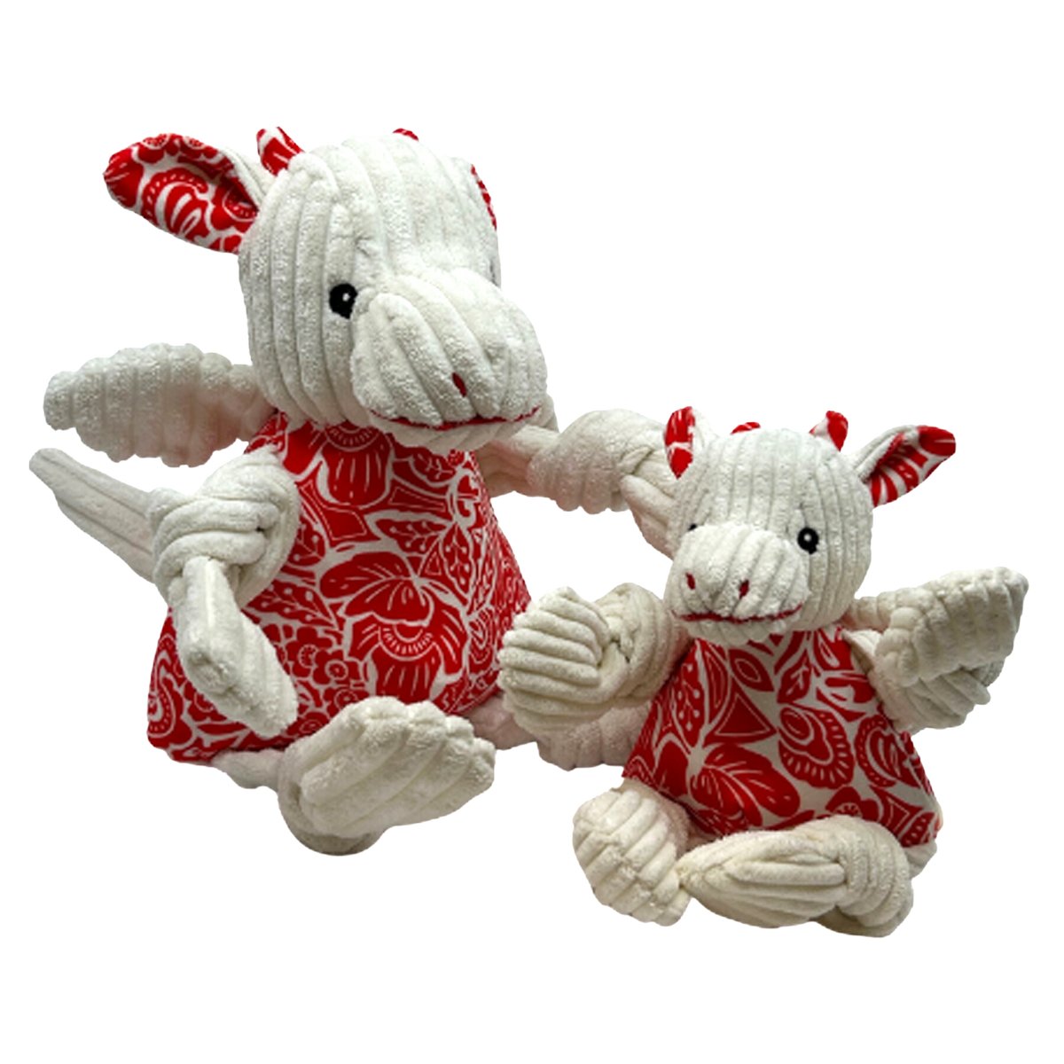 Plush dog toy set with two white pups in red patterned dresses, stitched black eyes