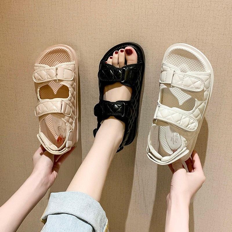 Set of sandals in black and two light colors, each with two hook-and-loop straps