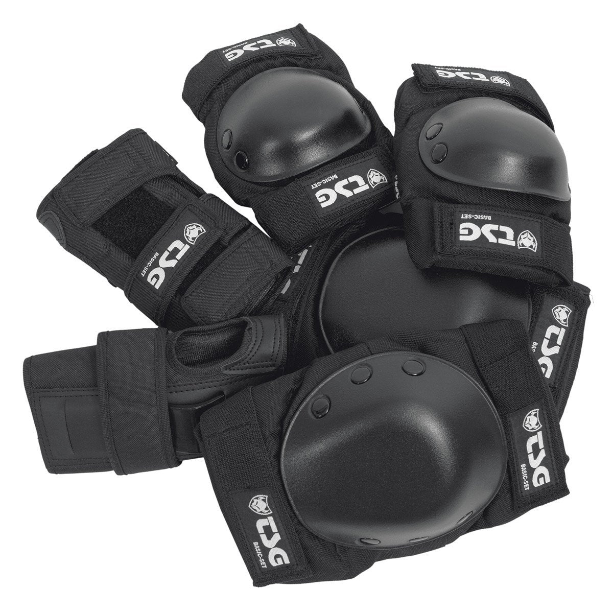 Black protective skate pads set laid out: wrist guards, elbow pads, knee pads