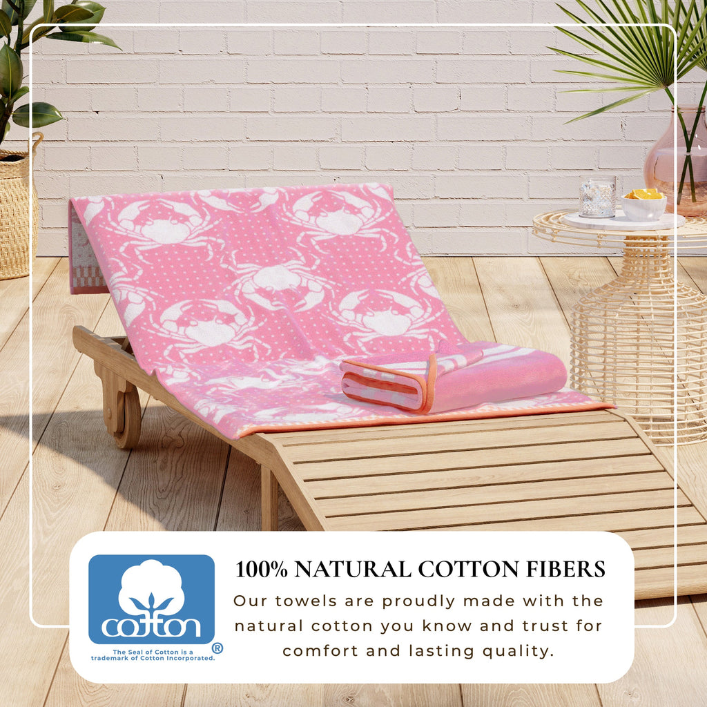 Pink cotton velour beach towel with white sea turtle pattern