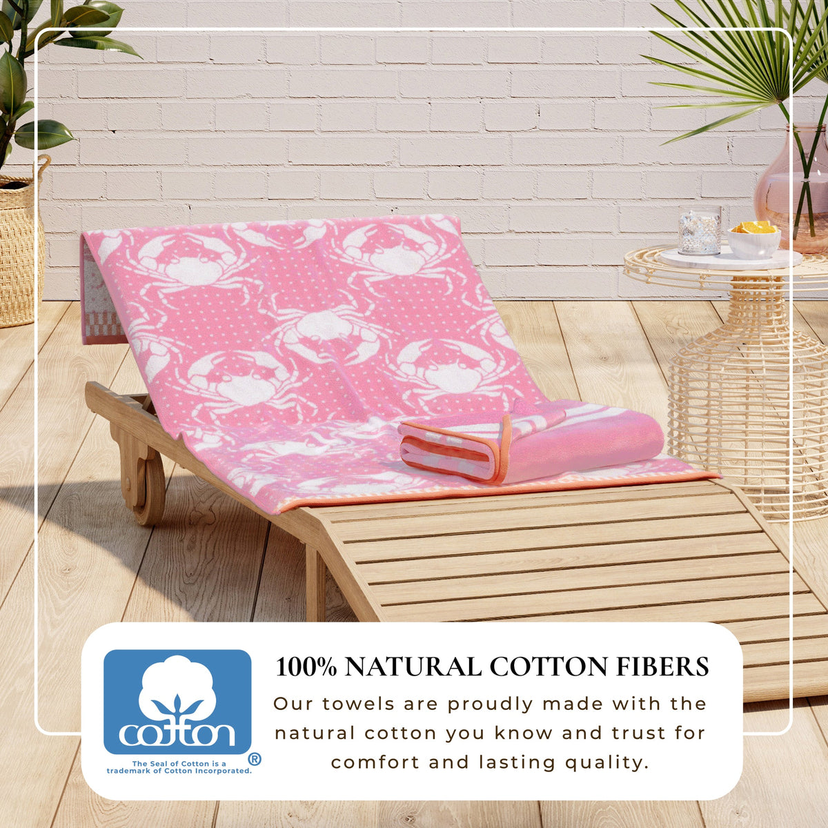 Pink cotton velour beach towel with white sea turtle pattern