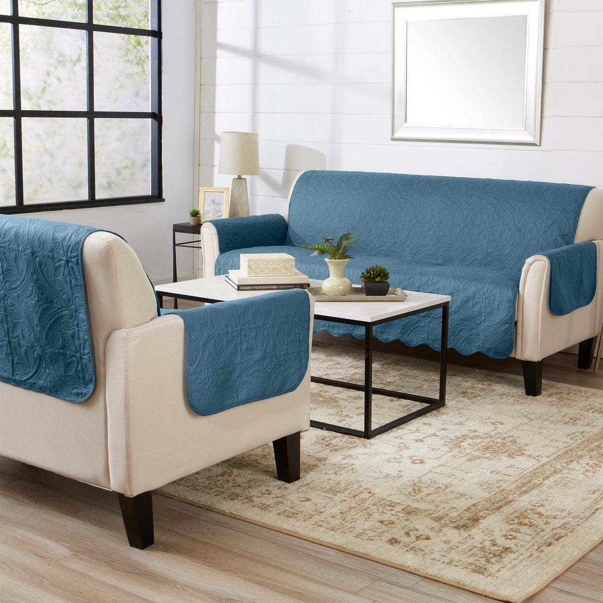 Blue medallion furniture protector set on sofa and armchairs with beige arm panels
