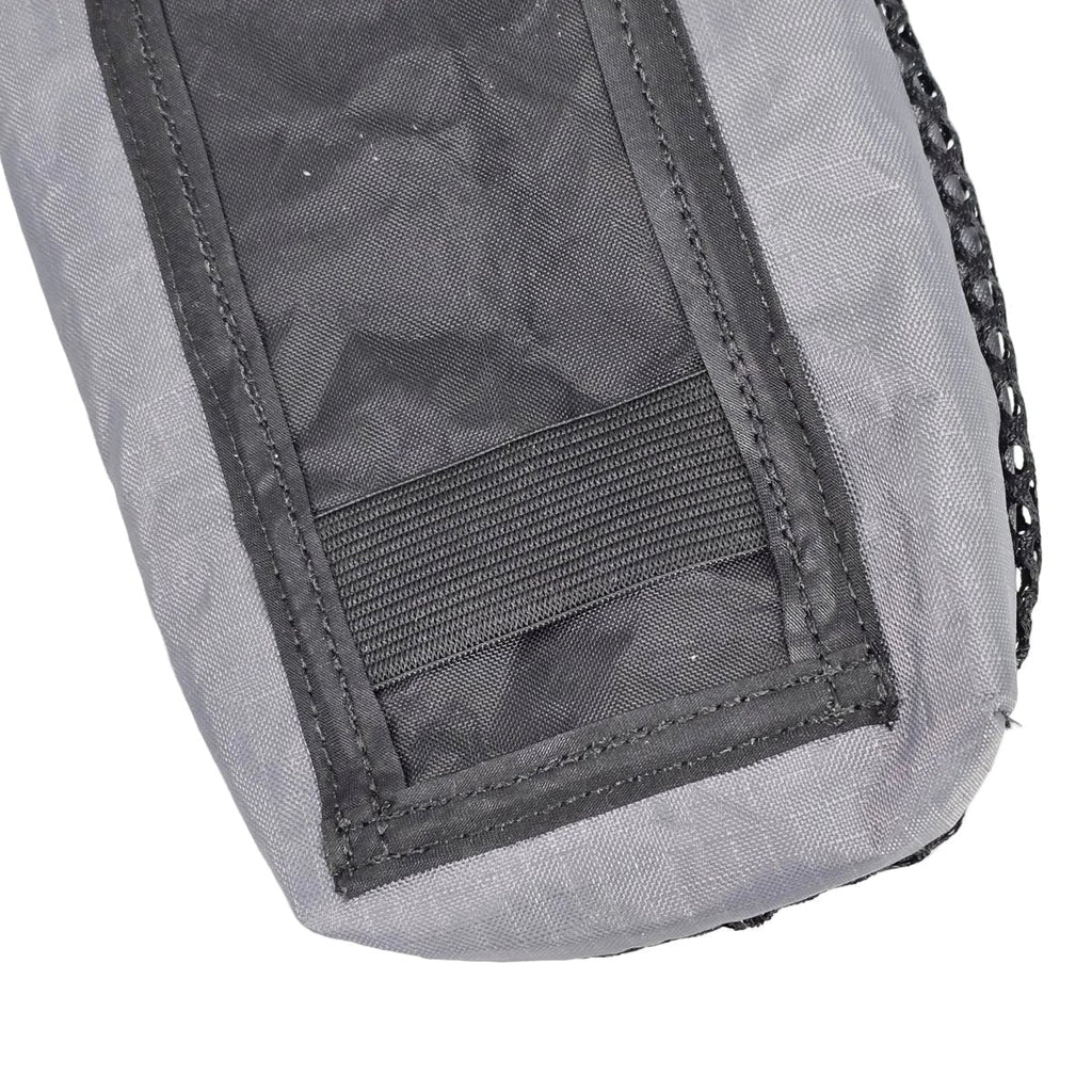Ultralight bottle pouch close-up: gray fabric with front mesh and stitched panel