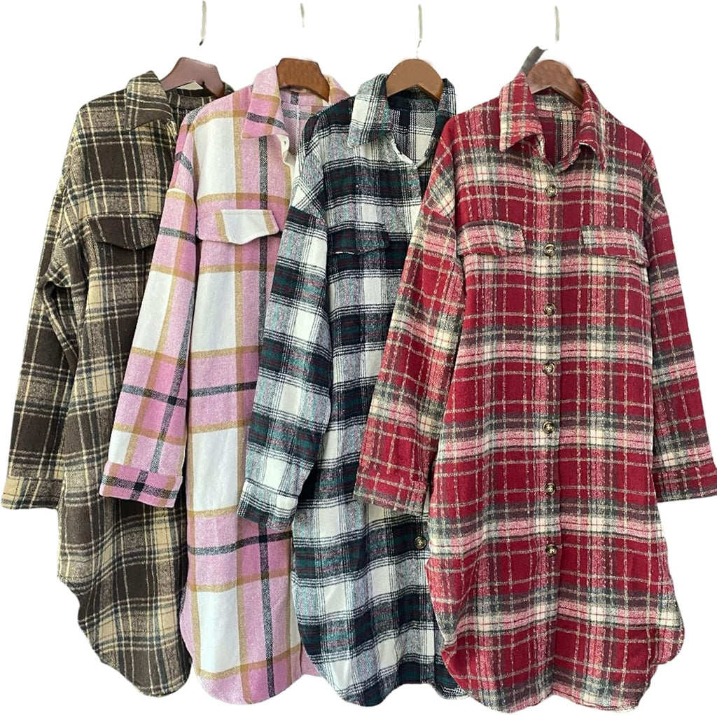 Assorted plaid flannel shackets on hangers: black, pink, teal, and red button-front