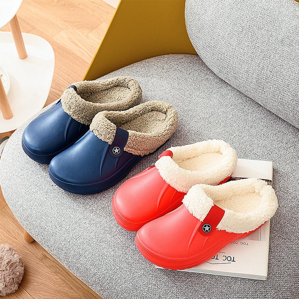 Blue and red unisex winter clogs with plush sherpa lining and star accents
