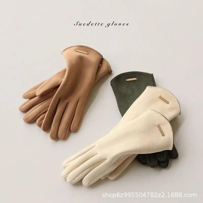 Suede touchscreen gloves in tan/brown, with small metal tab on back and 5-finger style.