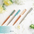 Manifestation pen set: four decorative pens with copper and silver bodies, blue and green glitter tips