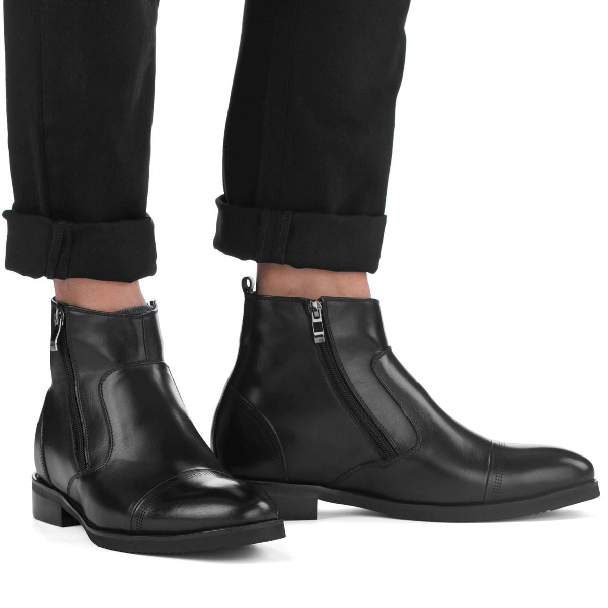Black zipper ankle boots on legs, side-by-side view